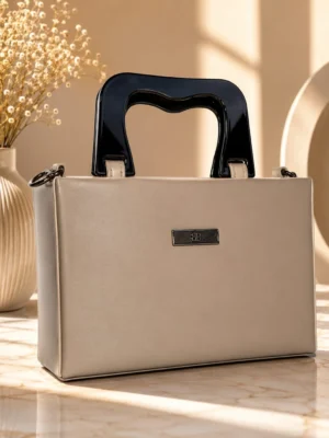 Elegant Structured Handbag with Stylish Statement Handle