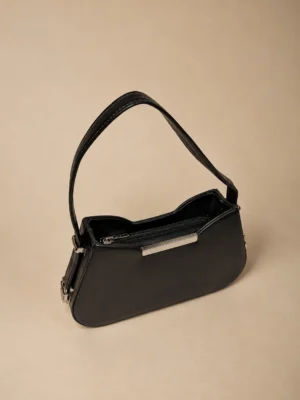 Elegant Minimalist Sling Bag with Curved Silhouette and Sleek Strap